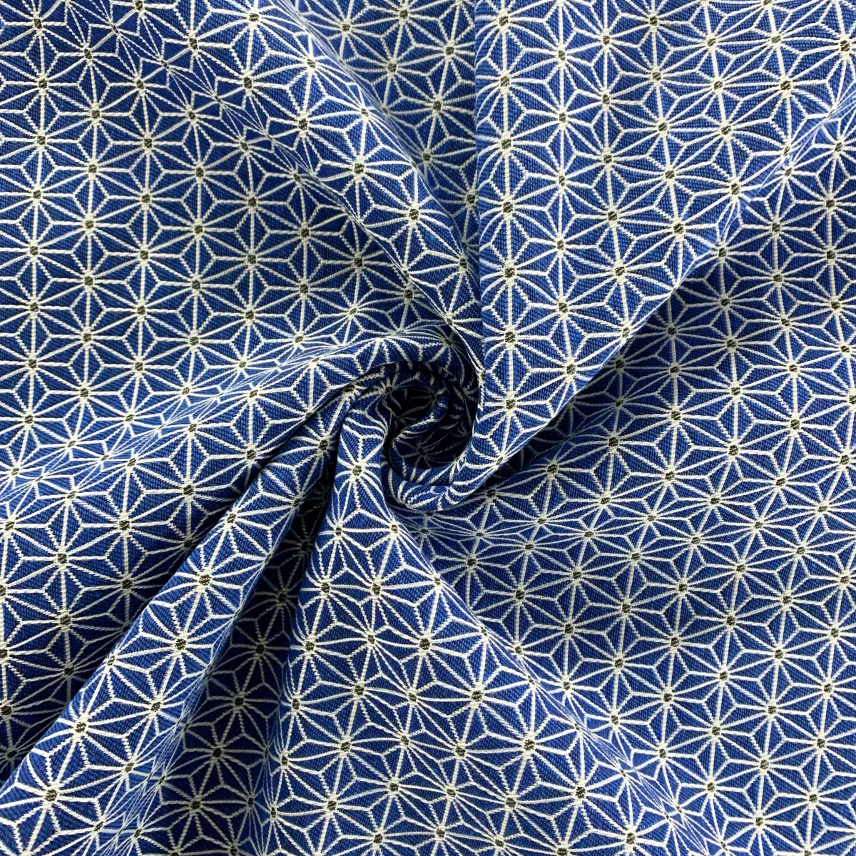 Tissu jacquard étoiles géométrique - 140 cm de large - Fond bleu marine